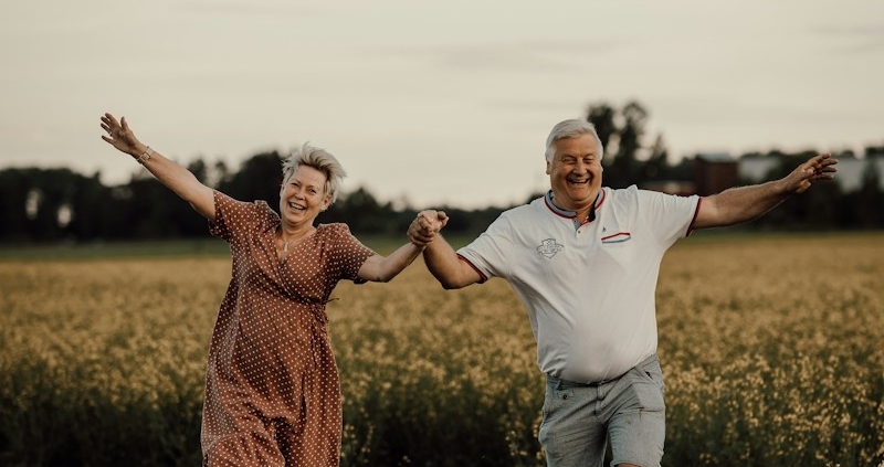 a man and woman jumping in the air
