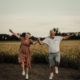 a man and woman jumping in the air