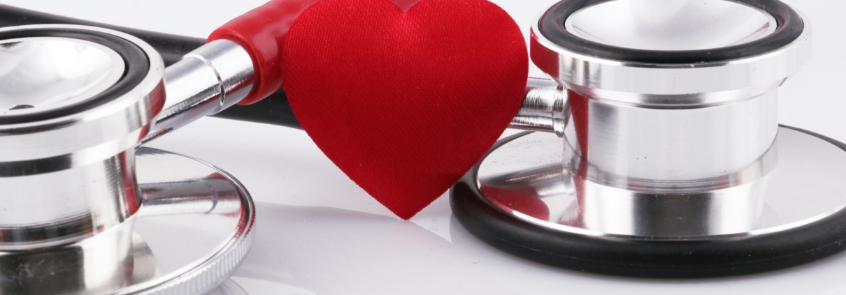 a stethoscope with a red heart on top of it