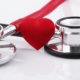 a stethoscope with a red heart on top of it